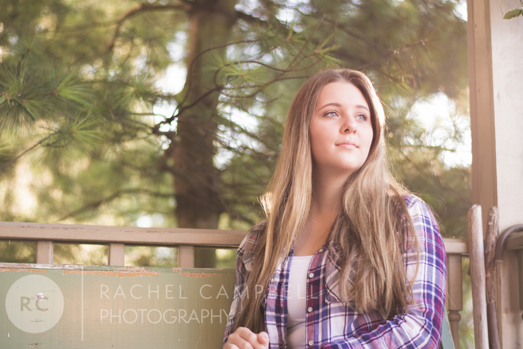Senior portrait of a young woman sitting on a bench in Solon Ohio
