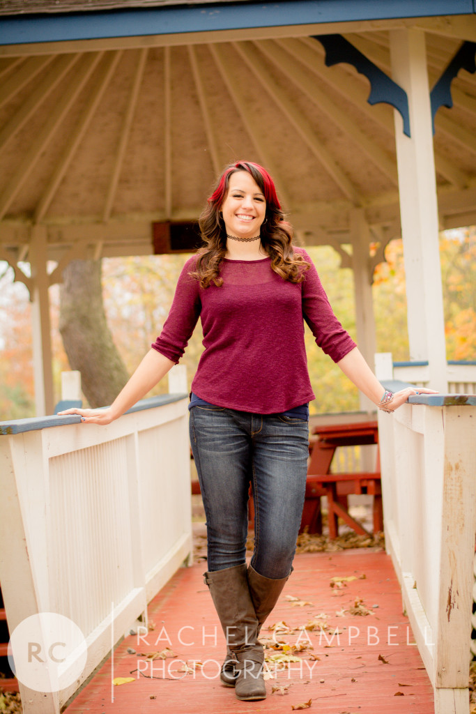 Senior portrait of a young woman in front of a gazebo in Solon Ohio
