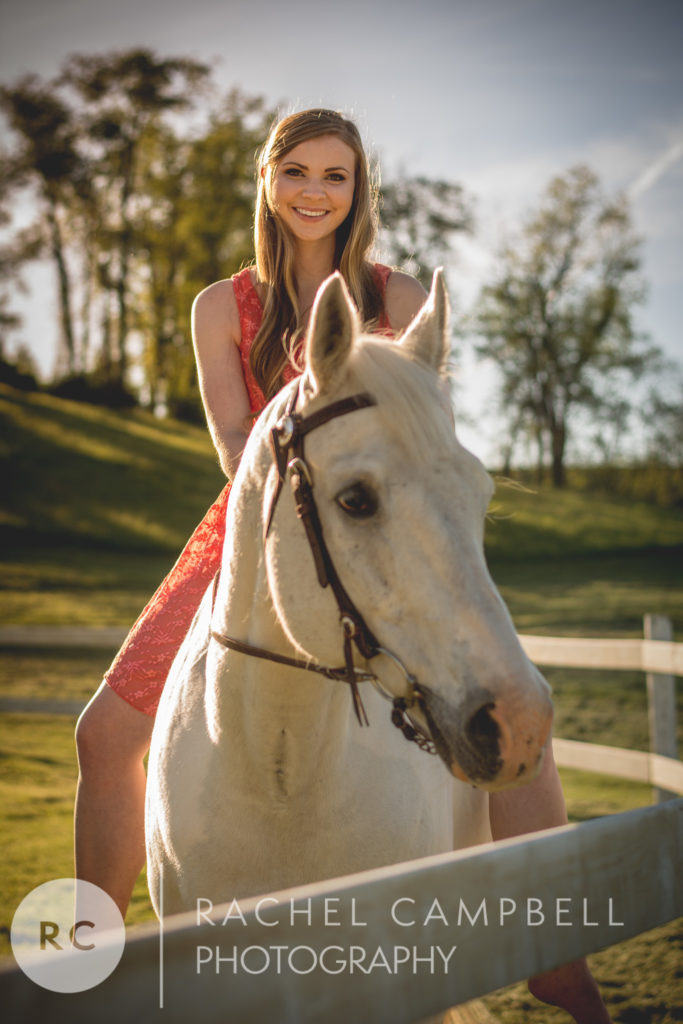 Senior portrait of a young woman riding her horse in Solon Ohio