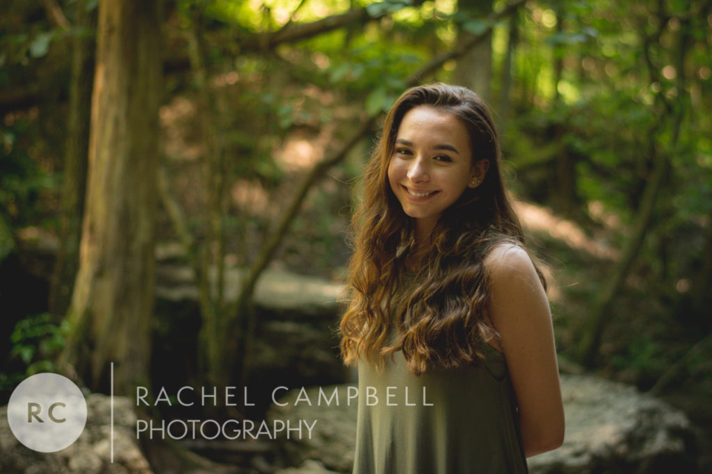 Senior portrait of a young woman in the woods in Solon Ohio